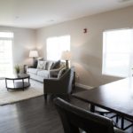 Dining and living room at Broadleaf Boulevard Apartments in Manchester